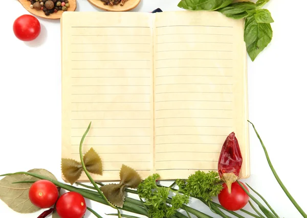 stock image Book for recipes, vegetables and spices, isolated on white