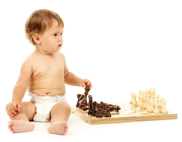 Cute baby and chess isolated on white — Stock Photo, Image