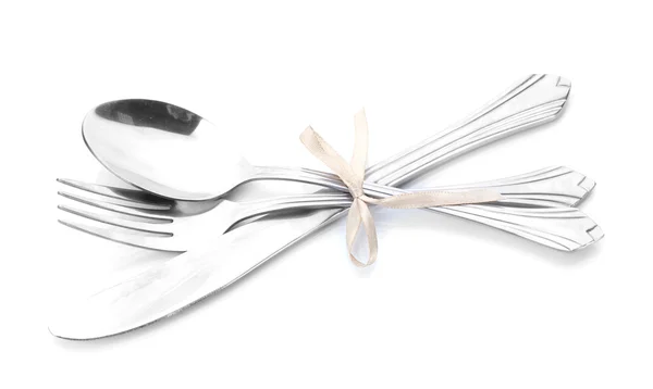 Garfo de prata, colher e faca amarrada com fita isolada em branco — Fotografia de Stock