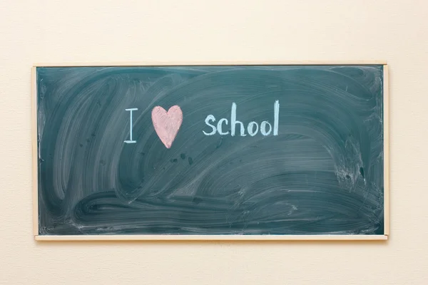 I love school - written in colorful chalk on the blackboard — Stock Photo, Image