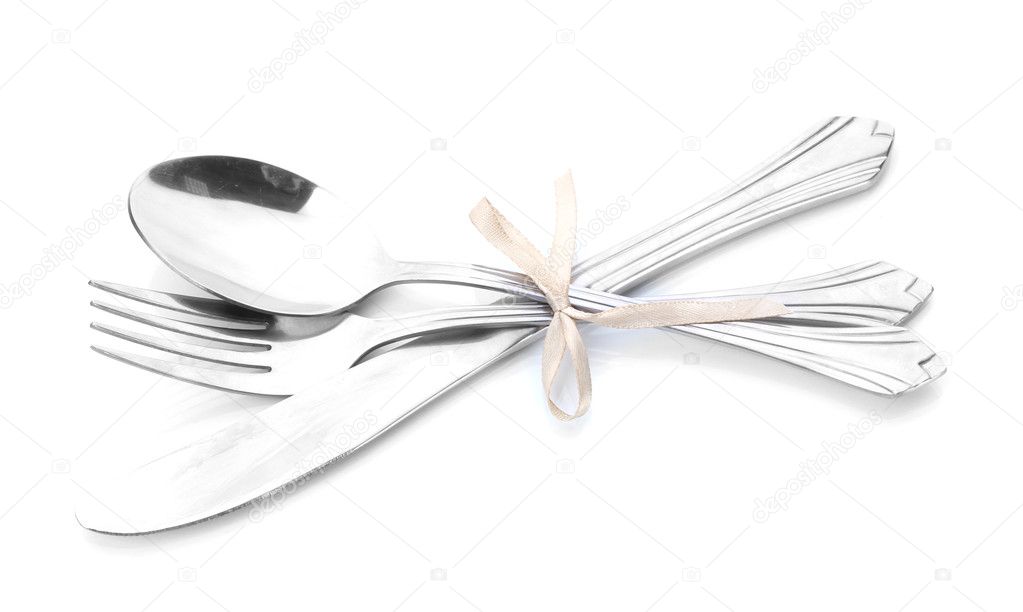 Silver fork, spoon and knife tied with ribbon isolated on white