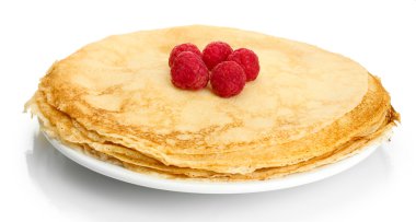 Delicious pancakes with raspberries on plate isolated on white