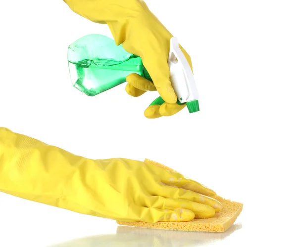 Superficie de limpieza en guantes de color amarillo brillante con esponja y producto de limpieza sobre fondo blanco — Foto de Stock