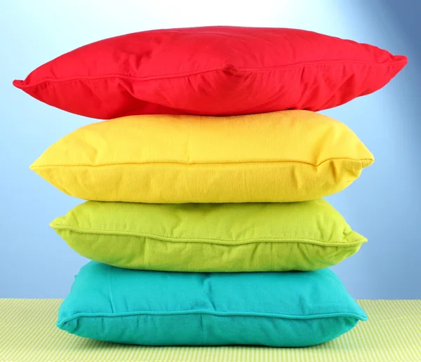 Pillows on blue background — Stock Photo, Image