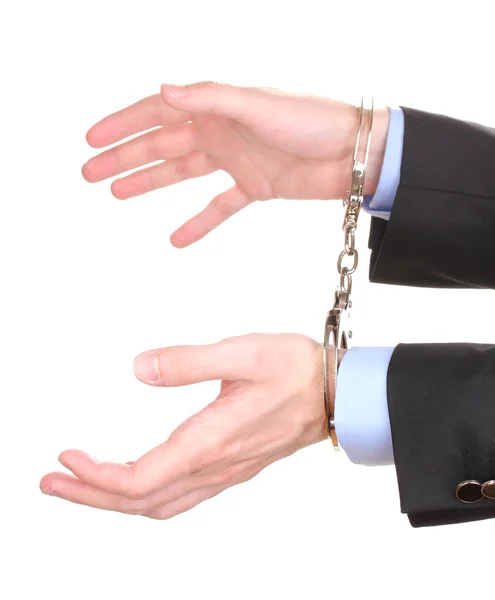 Businessman hands fettered with handcuffs isolated on white — Stock Photo, Image
