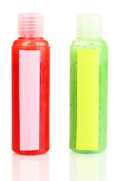 Bottles with scrub isolated on white — Stock Photo, Image