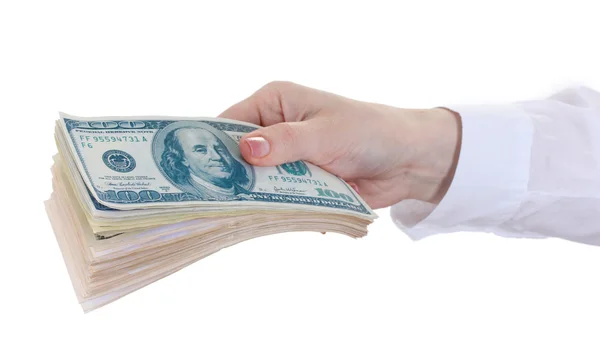 Amerikanische Dollars in einer Frauenhand auf weißem Hintergrund — Stockfoto