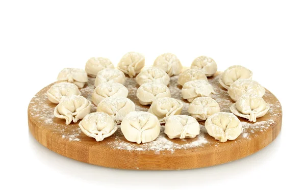 Raw Dumplings on cutting board isolated on white — Stock Photo, Image