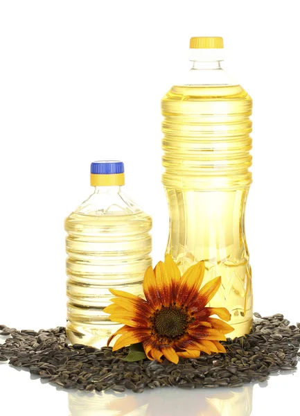 Beyaz arka plan üzerinde izole bir plastik şişelerde ayçiçek yağı — Stok fotoğraf