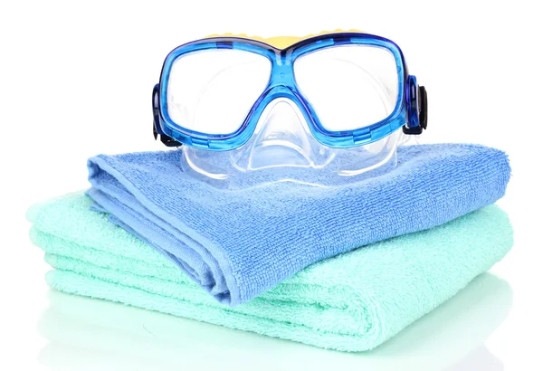 Swim goggles on towel isolated on white — Stock Photo, Image