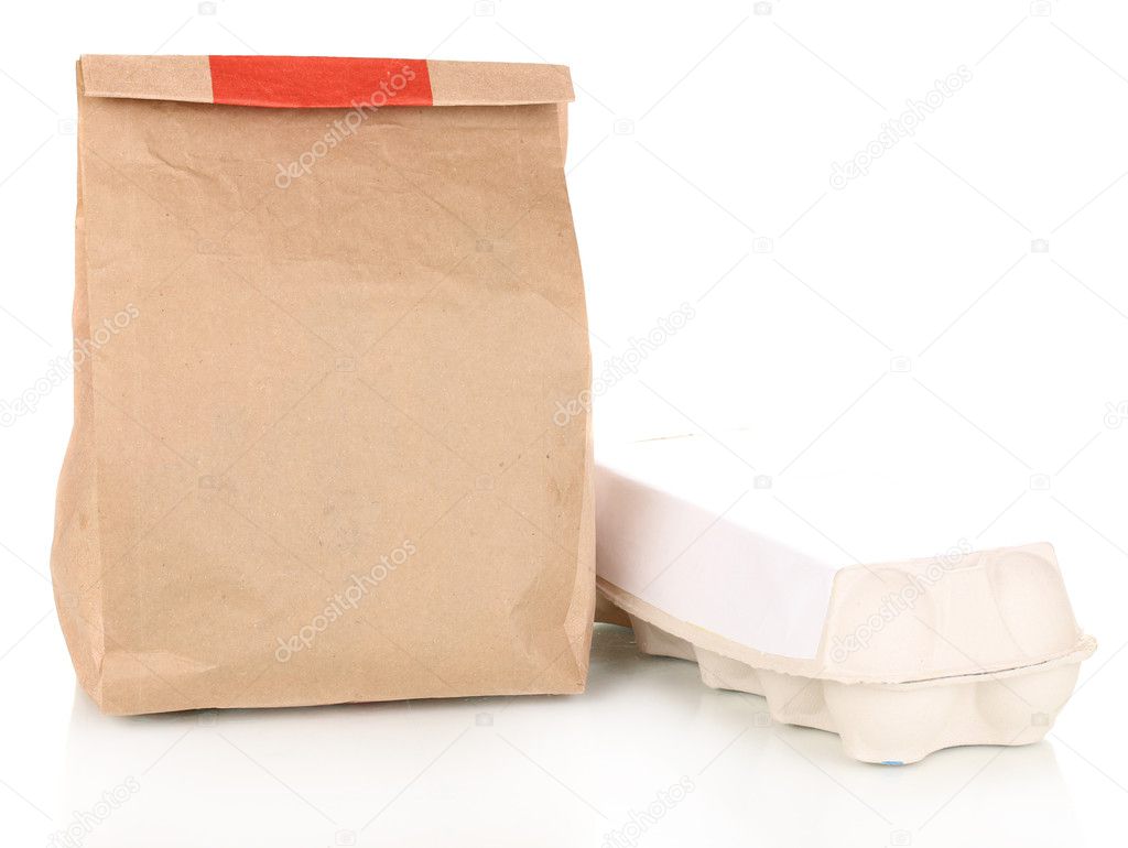 Closed paper bag with food isolated on white