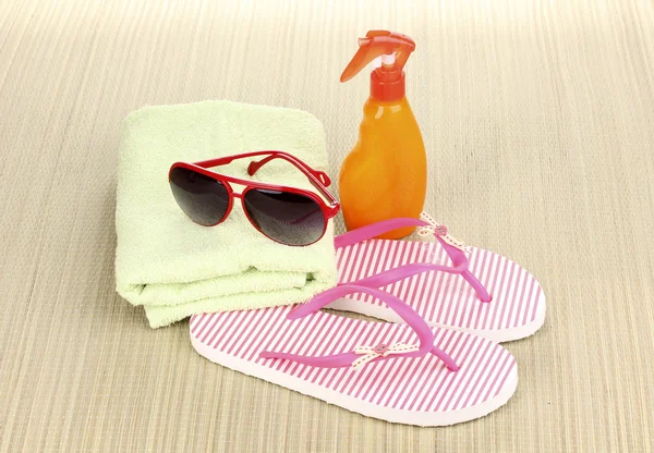 Beach accessories on mat — Stok fotoğraf