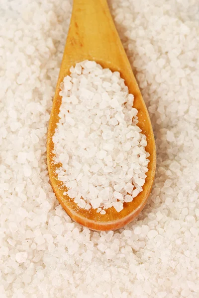 Sea salt with wooden spoon close-up — Stock Photo, Image