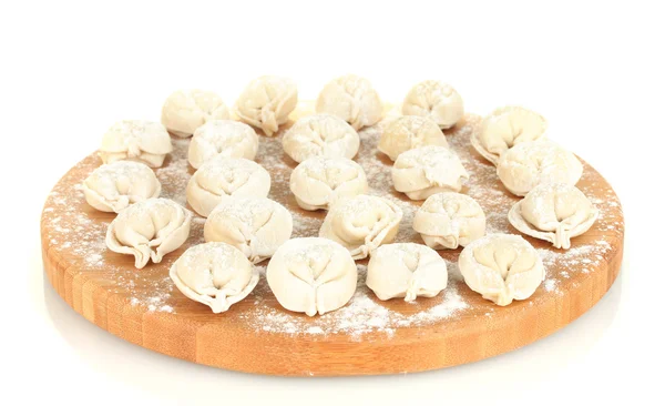 Сирі вареники на обробній дошці ізольовані на білому — стокове фото