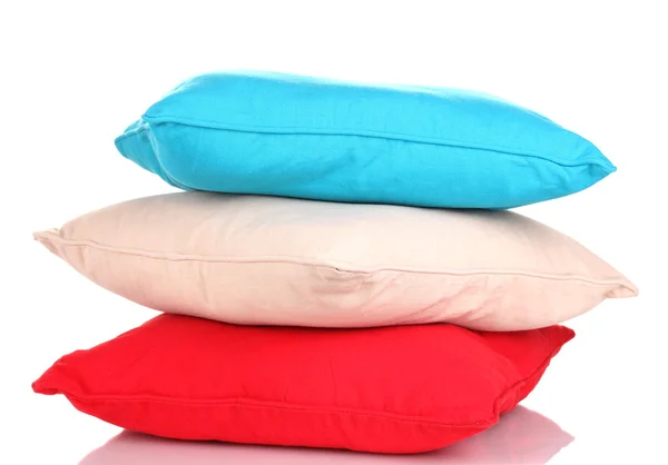 Яркие цветные подушки изолированы на белом — стоковое фото