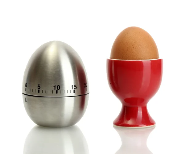 Temporizador de huevo y huevo en soporte rojo aislado en blanco — Foto de Stock