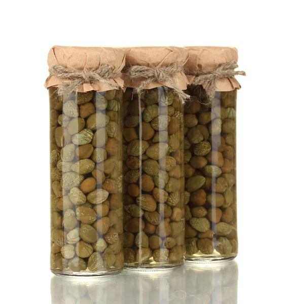 Glass jar with tinned capers isolated on white — Stock Photo, Image