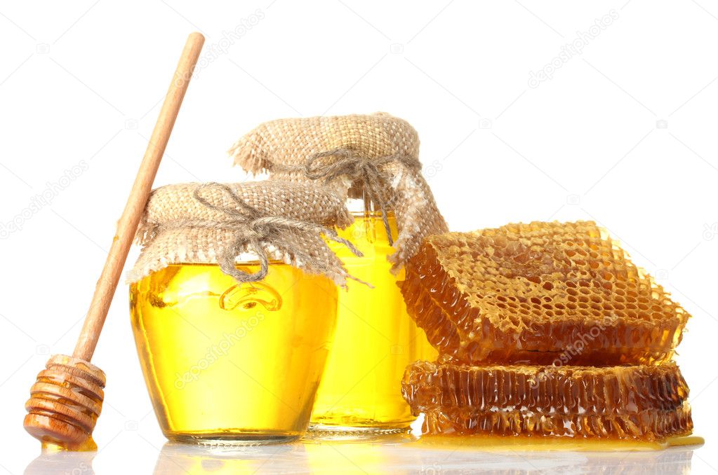 Sweet honeycombs, wooden drizzler, and jars with honey, isolated on white