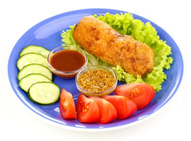 Tasty meat cutlet with garnish on plate isolated on white