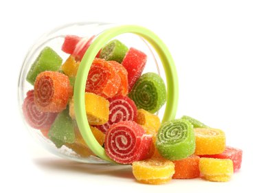 Colorful jelly candies in glass jar isolated on white clipart