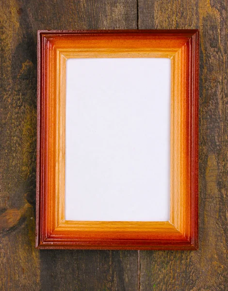 木制背景上的木制框架 — 图库照片