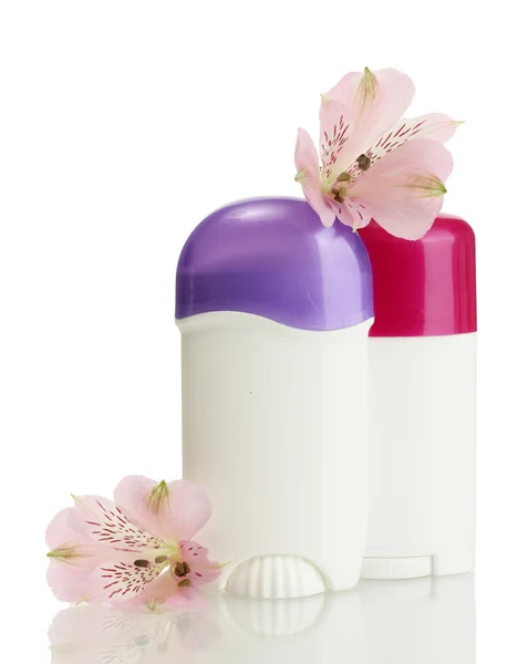 Desodorantes con flores aisladas en blanco — Foto de Stock