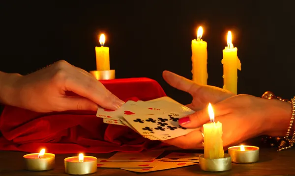 stock image Fortune-telling and woman's hands on black backcground