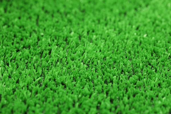 Фон искусственной зеленой травы — стоковое фото