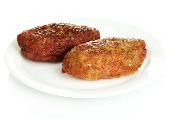 Hambúrgueres saborosos na placa isolado em branco — Fotografia de Stock