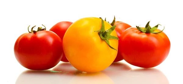 stock image Red and yellow tomatoes isolated on white