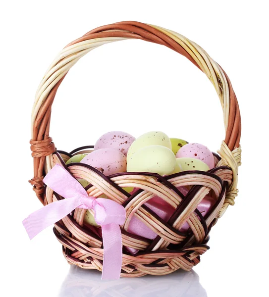 Basket with Easter eggs isolated on white — Stock Photo, Image