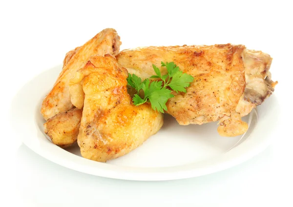 Roasted chicken wings and leg with parsley in the plate isolated on white — Stock Photo, Image