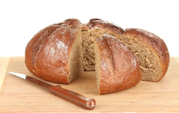 Brot in Scheiben auf weißem Hintergrund in Großaufnahme — Stockfoto