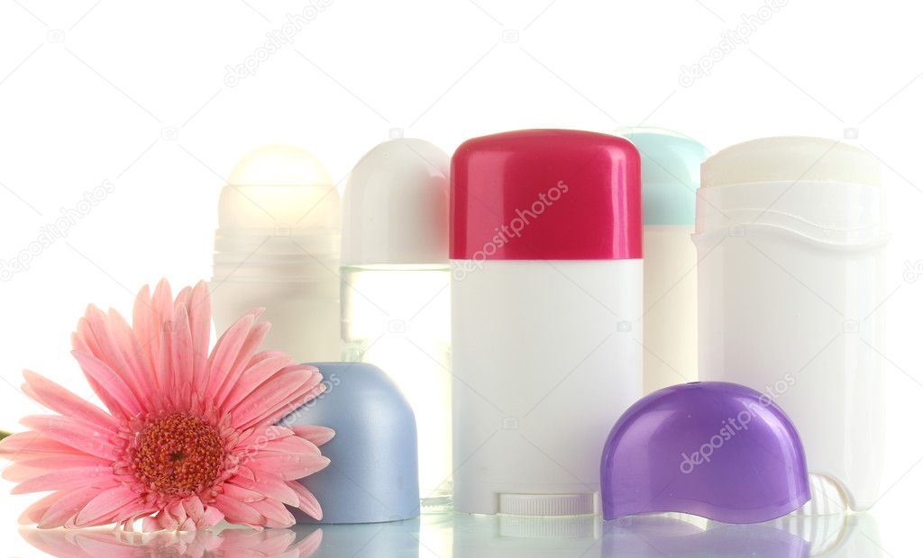 Deodorant and flower isolated on white