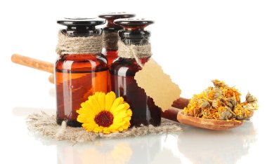 Medicine bottles and calendula, isolated on white clipart