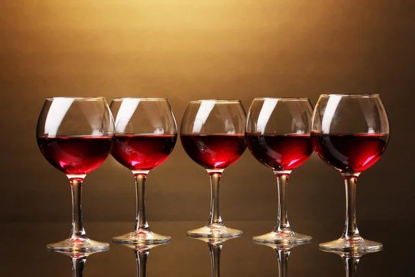 Wineglasses on brown background — Stock Photo, Image