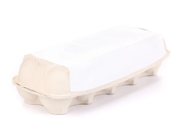 Uova in scatola di carta isolata su bianco — Foto Stock
