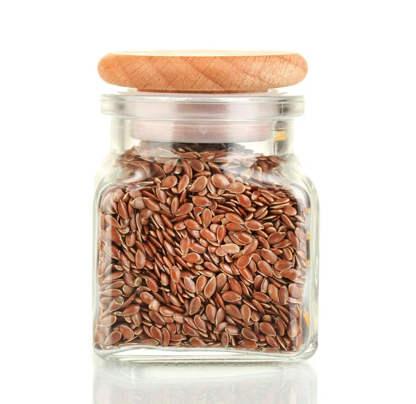 Flax seeds in glass jar isolated on white — Stock Photo, Image