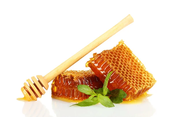Sweet honeycombs with mint and drizzler, isolated on white — Stock Photo, Image