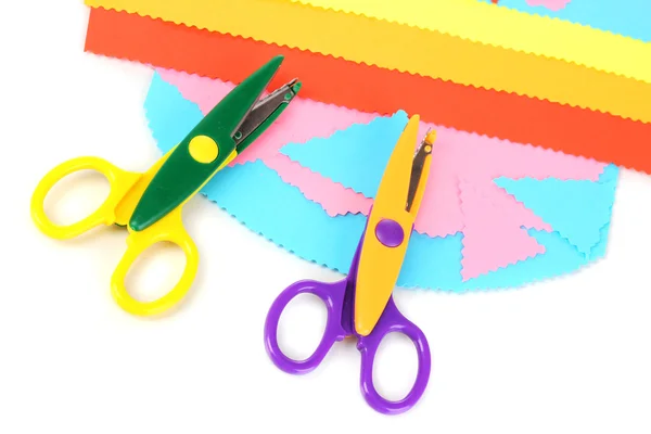 Colorful zigzag scissors with color paper isolated on white — Stock Photo, Image