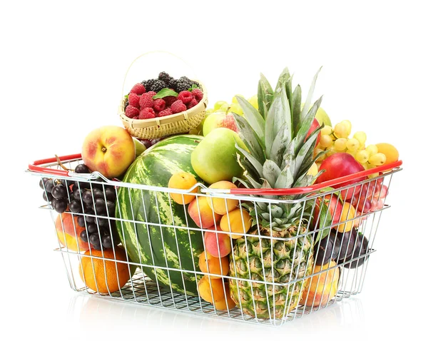 Surtido de frutas exóticas en canasta metálica aislada en blanco — Foto de Stock