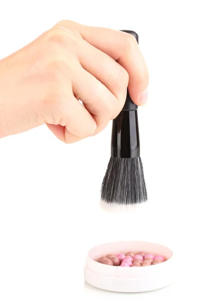 Black brush for make-up with powder balls in hand isolated on white — Stock Photo, Image