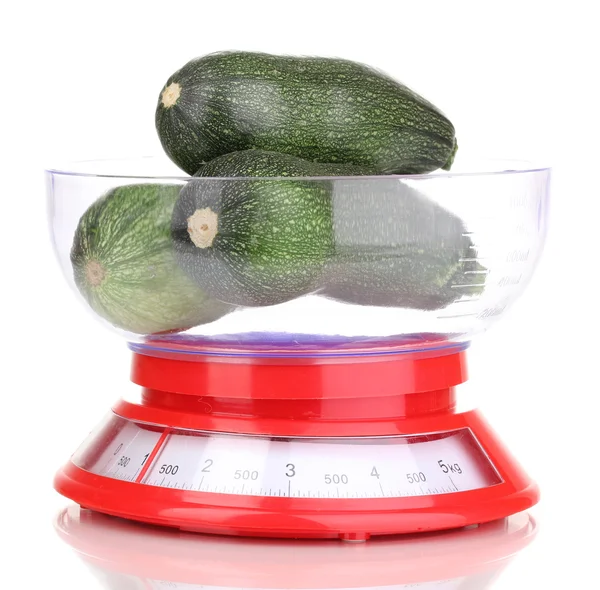 Fresh zucchini in scales isolated on white — Stock Photo, Image