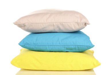 Bright color pillows isolated on white