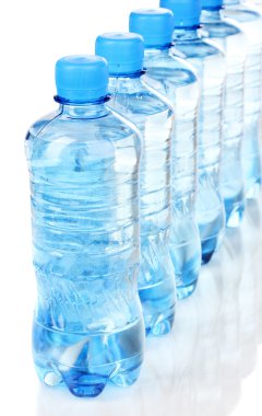 Plastic bottles of water isolated on white