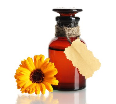 Medicine bottle and beautiful calendula flower, isolated on white clipart