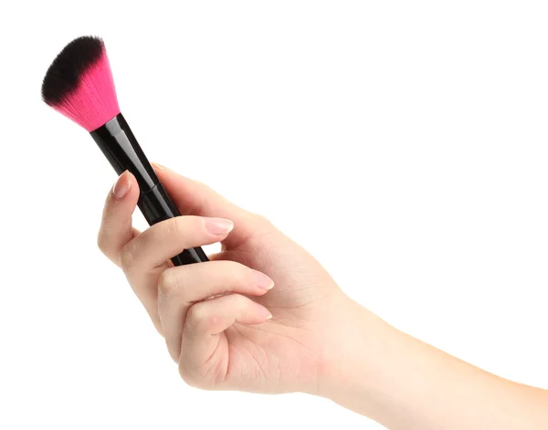 Hand met zwarte borstel voor make-up geïsoleerd op wit — Stockfoto