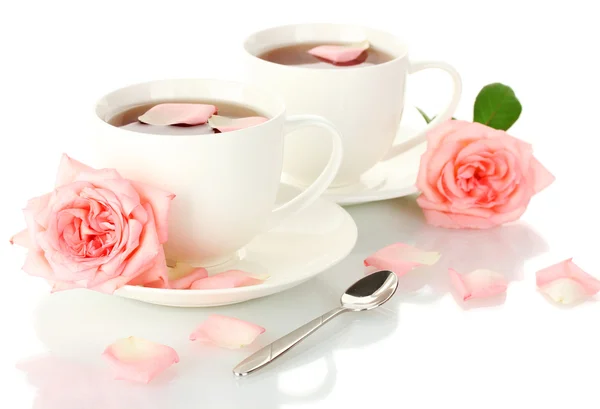 Cups of tea with roses isolated on white — Stock Photo, Image