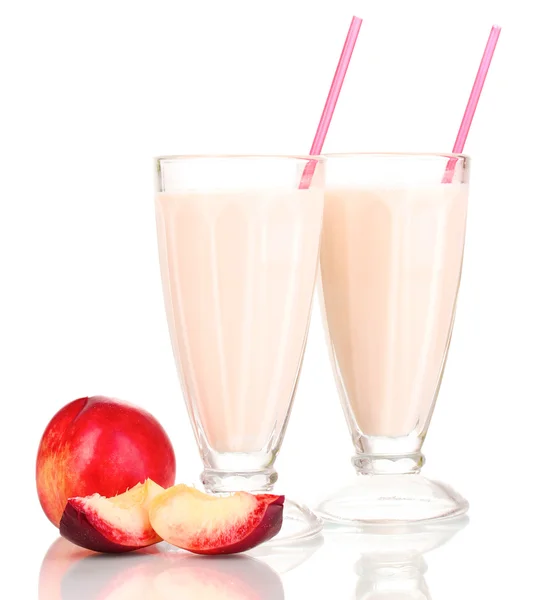 Peach milk shakes isolated on white — Stock Photo, Image