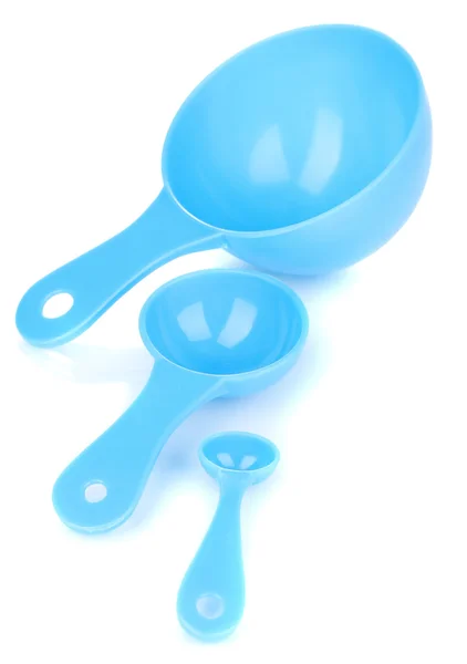 Cucharas de medición azules aisladas en blanco — Foto de Stock